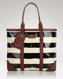The tote bag goes glossy. kate spade new york gives its daytime classic a high-shine update with patent leather and travel-ready trims.