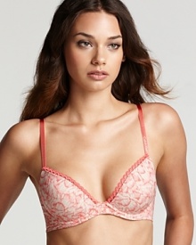 An abstract printed underwire bra with ornate scalloped edge trim from Calvin Klein.
