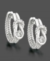 Turn an every day look into utter elegance with Everlon's diamond hoop earrings. Each earring features a round-cut diamond (1/4 ct. t.w.) in a sleek sterling silver setting. Approximate drop: 5/8 inch.