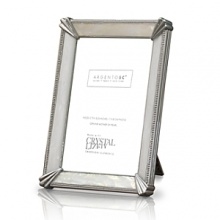 Present your treasured memories in this sleek and cherished genuine mother of pearl frame. Natural mother of pearl shines with its iridescent glow. The frame also uses a full metal back. Arrives in a gift box. Present your treasured memories in this sleek and cherished genuine mother of pearl frame. Natural mother of pearl shines with its iridescent glow. The frame also uses a full metal back. Arrives in a gift box.