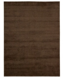 Skilled hand-carving creates an absorbing geometric block pattern on this premium Nourison area rug. Crafted with the timeless art of Tibetan hand-knotting, this deep brown piece features a soft blend of wool and Luxcelle fibers for a distinctive, satiny texture and sheen. Skilled hand-carving creates an absorbing geometric block pattern on this premium Nourison area rug. Crafted with the timeless art of Tibetan hand-knotting, this deep brown piece features a soft blend of wool and Luxcelle fibers for a distinctive, satiny texture and sheen.