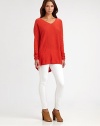 Relaxed-fitting v-neck sweater lends a vibrant pop of color to any casual ensemble.V-neckLong sleeveAbout 28 from shoulder to hemCottonDry cleanImported Model shown is 5'10 (180cm) wearing a US size Small.This style runs true to size. We recommend ordering your usual size for a standard fit. 