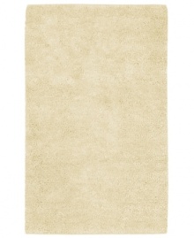 Step into ultimate softness with this opulent area rug, hand-woven with sumptuous New Zealand felted wool. In a cool ivory tone, this lush piece fits both traditional and contemporary decor. Step into ultimate softness with this opulent area rug, hand-woven with sumptuous New Zealand felted wool. In a cool ivory tone, this lush piece fits both traditional and contemporary decor.