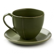 Borrowing from nature, these porcelain cups and saucers have a highly glossed surface and unusual contours, creating an interesting silhouette - a DVF signature - on the table. Borrowing from nature, these porcelain cups and saucers have a highly glossed surface and unusual contours, creating an interesting silhouette - a DVF signature - on the table.