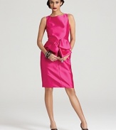 An oversize bow at the waist lends feminine charm to this richly hued and impeccably tailored Carmen Marc Valvo dress.