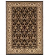 Pulling inspiration from the masterwork of 16th and 17th-century Persian artisans, this heirloom-quality rug adheres to centuries-old tradition with an unmatched beauty that still holds up today. An intricate, full-frame curvilinear pattern features swirling Arabesques and blossoms set in a rich palette of ebony and creme. Meticulously styled, the use of ultra-fine yarn allows for superb detail, crisp design and a soft hand. One-year limited warranty.1.5 million points of yarn per square meter