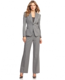 A subtle pinstripe and crisp details ensure this Tahari By ASL pantsuit will look polished for years to come. A subtle pinstripe and crisp details ensure this Tahari By ASL pantsuit will look polished for years to come.