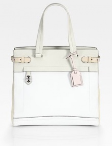 Stash your essentials in this impeccably tailored silhouette of colorblock Nappa leather, accented with sleek buckles and polished hardware.Double top handles, 6¾ drop Outside zip pocket Protective metal feet Two inner compartments One center zip-compartment One inside zip pocket Cotton lining 14W X 12¼H X 5½D Imported