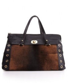 Goldtone grommets and lusciously soft full-grain leather accentuate the richly hued ponyhair pocket on the St. Germain shopper from Furla. Goldtone grommets and lusciously soft full-grain leather accentuate the richly hued ponyhair pocket on the St. Germain shopper from Furla.