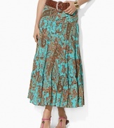 Intricate paisley on soft woven cotton exudes rich femininity in a flowing, tiered, long silhouette.