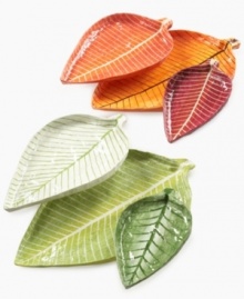 Nesting Leaf trays serve great purpose in your home and for the artist, Moro of Jacmel. Green leaves made of recycled paper to resemble the Caribbean nation's fall foliage are ideal for serving dry goods and organizing trinkets on a nightstand or dresser. Nesting Leaf trays serve great purpose in your home and for the artist, Moro of Jacmel. Green leaves made of recycled paper to resemble the Caribbean nation's fall foliage are ideal for serving dry goods and organizing trinkets on a nightstand or dresser.