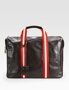 Everything is safe and at-hand in this sturdy calfskin leather design, crafted for a lifetime of use and wear. Cotton webbing adds color to the sides and extends to the handles. Double top handles Zip closure Interior organizational pocket Lined in cotton 15½W X 11½H X 4D Imported Everything is safe and at-hand in this sturdy calfskin leather design, crafted for a lifetime of use and wear. Cotton webbing adds color to the sides and extends to the handles. Double top handles Zip closure Interior organizational pocket Lined in cotton 15½W X 11½H X 4D Imported