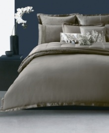 Indulge in elegance. This Donna Karan Modern Classics Truffle quilt pairs cotton and silk textures over a muted landscape for a clean, sophisticated finish. Indulge in elegance. This Donna Karan Modern Classics Truffle quilt pairs cotton and silk textures over a muted landscape for a clean, sophisticated finish.