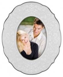 With the delicate vines and raised dots of the Lenox fine china collection, this Opal Innocence picture frame offers a look of classic elegance in platinum-banded porcelain. Qualifies for Rebate With the delicate vines and raised dots of the Lenox fine china collection, this Opal Innocence picture frame offers a look of classic elegance in platinum-banded porcelain. Qualifies for Rebate