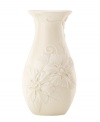 Teeming with fresh blooms, the Floral Fields vase from Lenox exudes a serene, understated elegance. A simple silhouette in creamy ivory porcelain balances elaborate sculpted detail. Qualifies for Rebate