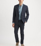 Slim-straight fit trouser in a spotted wool finish, treated to give the slubby-feel of a cozy, casual pant.Flat-front styleSide slash, back welt pocketsInseam, about 30WoolDry cleanImported