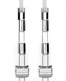 Dim the lights and turn up the glamor with Rivera candlesticks from Lighting by Design. Stacks of glistening crystal create a bold geometric look and retro feel to complement contemporary-chic dining tables and living room decor.