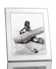 Delicately beaded edges add to the resplendent beauty of this Silver Bead picture frame from Martha Stewart Collection. Simply timeless in brilliant silver plate, it brings new attention to the past. With velvet backing. Delicately beaded edges add to the resplendent beauty of this Silver Bead picture frame from Martha Stewart Collection. Simply timeless in brilliant silver plate, it brings new attention to the past. With velvet backing.