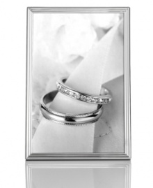 Keep the focus on the photos. With a classic edge of ridged silver plate, the Cascade picture frame from Martha Stewart Collection lends quiet elegance to your personal gallery. Keep the focus on the photos. With a classic edge of ridged silver plate, the Cascade picture frame from Martha Stewart Collection lends quiet elegance to your personal gallery.