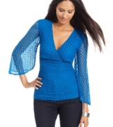 Style&co.'s latest top is perfect for date night with a stunning silhouette, dot motif and dramatic sheer bell sleeves.