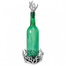 Cork the wine in advance and serve it in this distinctive set. The bottle rests on a coaster hidden within a coral cluster, and the stopper is topped with more coral branches. Cork the wine in advance and serve it in this distinctive set. The bottle rests on a coaster hidden within a coral cluster, and the stopper is topped with more coral branches.