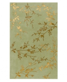 Delicate branches stretch across the smooth teal ground of this chic and sophisticated area rug from Surya. Made with a mix of wool and art silk, this hand-tufted rug has a luxurious luster that lifts the profile of any room. Delicate branches stretch across the smooth teal ground of this chic and sophisticated area rug from Surya. Made with a mix of wool and art silk, this hand-tufted rug has a luxurious luster that lifts the profile of any room.