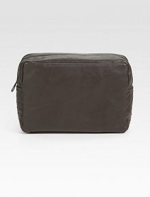 Travel with style and sophistication with this travel case crafted in signature woven Italian calfskin leather.Zip closureLeather7½W x 4¼H x 1¾DMade in Italy