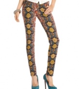 Get bright: a super-vivacious snakeskin-print brings trend-right style to a pair of five-pocket skinny jeans that won't be ignored! From Celebrity Pink Jeans.