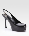 Supple Italian leather articulated in a strikingly modern slingback design.Self-covered heel, 4¼ (110mm) Hidden platform, 1 (25mm) Compares to a 3¼ heel (80mm) Leather lining and sole Padded insole Made in ItalyOUR FIT MODEL RECOMMENDS ordering one half size up as this style runs small. 