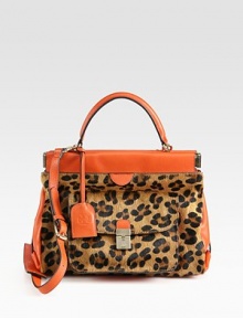 A bold style in animal print calf hair and supple leather, perfectly sized for all your essentials.Top handle, 4 dropDetachable adjustable leather shoulder strap, 16½-18½ dropHinged closureProtective metal feetTwo inner compartmentsOne outside flap pocketOne outside zip pocketOne inside zip pocketTwo inside open pocketsOne mirrorFully lined11½W X 8½H X 5½DImported