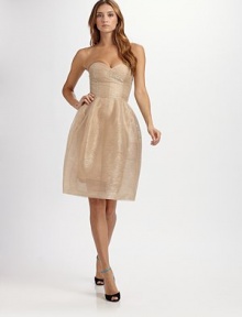 This evening-perfect sweetheart design is rendered in floaty layers of shimmering tulle.Strapless sweetheart necklinePrinces seamsFull gathered skirtConcealed back zipSilk liningAbout 26 from natural waistNylonMade in USA of Italian fabricDry cleanModel shown is 5'11 (180cm) wearing US size 4. 