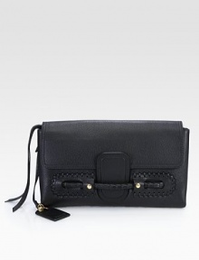 An oversized flap-top shape in pebble-grain leather with intricate front braided details. Flap closureInner zip compartmentTwo inside open pocketsFully lined15W X 9H X 2DMade in Italy