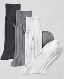 Solid cotton ribbed slack-length socks with polo player embroidered logo. 3 pairs to a pack. Solid cotton ribbed slack-length socks with polo player embroidered logo. 3 pairs to a pack.