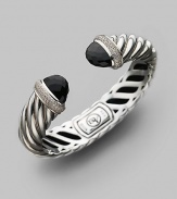 From the Waverly Collection. Sculpted cable design of sterling silver with pavé diamonds and black onyx tips. Diamonds, 0.76 tcw Diameter, about 2¼ Width, about 1¾ Hinge close Imported