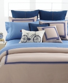 Clean and classic, this square decorative pillow complements the Khaki Oxford bedding from Tommy Hilfiger with its colorful grosgrain ribbon detailing and signature TH logo. Top other Tommy Hilfiger bedding collections with this pillow for a refined finishing touch. Clean and classic, this square decorative pillow complements the Khaki Oxford bedding from Tommy Hilfiger with its colorful grosgrain ribbon detailing and signature TH logo. Top other Tommy Hilfiger bedding collections with this pillow for a refined finishing touch.