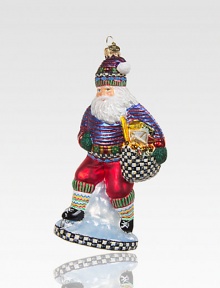 With a Courtly Check sack full of gifts, a glittering Santa glides across the ice, exquisitely crafted of mouth-blown, hand-painted glass.Glass6H X 3W X 2.5DImported Please note: Due to their handmade nature, ornaments may vary slightly. With a Courtly Check sack full of gifts, a glittering Santa glides across the ice, exquisitely crafted of mouth-blown, hand-painted glass.Glass6H X 3W X 2.5DImported Please note: Due to their handmade nature, ornaments may vary slightly.