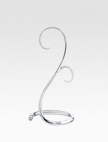 Display your lovely ornaments anywhere, any season, with this graceful crystal-accented stand that holds two at once.Silvertone Crystal accent About 7H X 4W Imported