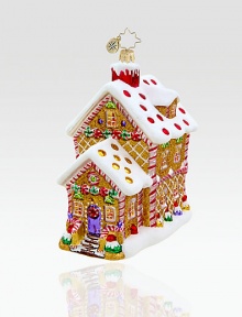 A scrumptious little house shines in handcrafted glittered glass adorned with a whimsical candy-cane pattern.Mouthblown, handpainted glass 5¼ high Made in Poland