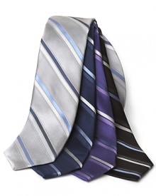 A handsome striped tie in matte silk for understated appeal. A handsome striped tie in matte silk for understated appeal.