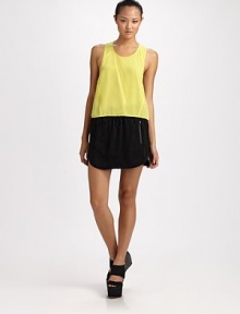 A sporty drawstring waist and exposed zip pockets shape this kicky mini.Elastic drawstring waistZip pocketsCurved front hemBack welt pocketsAbout 14 long90% triacetate/10% polyesterDry cleanImported A sporty drawstring waist and exposed zip pockets shape this kicky mini.Elastic drawstring waistZip pocketsCurved front hemBack welt pocketsAbout 14 long90% triacetate/10% polyesterDry cleanImported