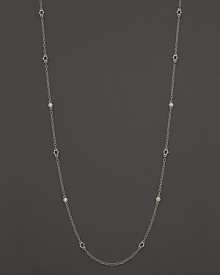 White sapphire stations shine on a sterling silver chain. From Judith Ripka.