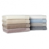 The velour front and absorbent terry cloth back makes this Hudson Park washcloth beautiful and functional.