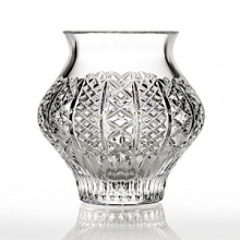 Elegant and timeless, this contemporary vase features diamond cuts and classic contours. A sophisticated addition to any table. Elegant and timeless, this contemporary vase features diamond cuts and classic contours. A sophisticated addition to any table.