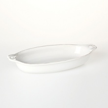Whether an elegant or casual meal, this shallow Juliska baker dish from the Berry & Thread collection will look great on your table, bubbling with your favorite dish.