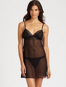Delicate swiss-dot tulle cut in a sexy babydoll silhouette that flatters every curve.Spaghetti strapsV-neckEmpire waist95% nylon/3% elastane/2% cottonHand washMade in Italy