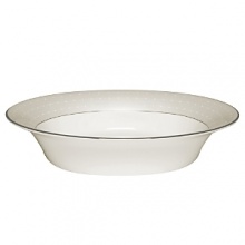 The embodiment of simplicity and grace, platinum bands and pure white stitches with raised dots adorn a pearlescent linen border. Inspired by the silk fabrics in Monique's evening gown designs, pearlized blue and tan accent colors create a look that is both elegant and beautifully serene.
