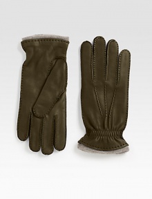 EXCLUSIVELY OURS. The perfect gift, crafted of supple deerskin with cashmere lining for maximum warmth.Cashmere liningDry clean by leather specialistMade in Italy