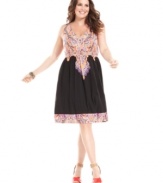 A spirited print electrifies INC's sleeveless plus size dress, defined by a flattering A-line shape.