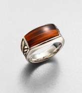 A modern style statement, in sterling silver with chevron detail and highlighted with a tiger's eye inlay.Sterling silverTiger's eyeAbout 1 diamImported