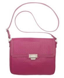 For that tech-savvy girl on-the-go, this signature 9 embossed iPad crossbody from Nine West is a fashion 10.  Polished silver-tone hardware complements the delicate detail stitching, while the fully lined interior safely stows iPad and other essentials with ease.